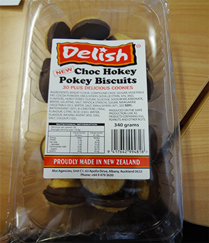 Plastic box of Delish Choc Hokey Pokey Biscuits