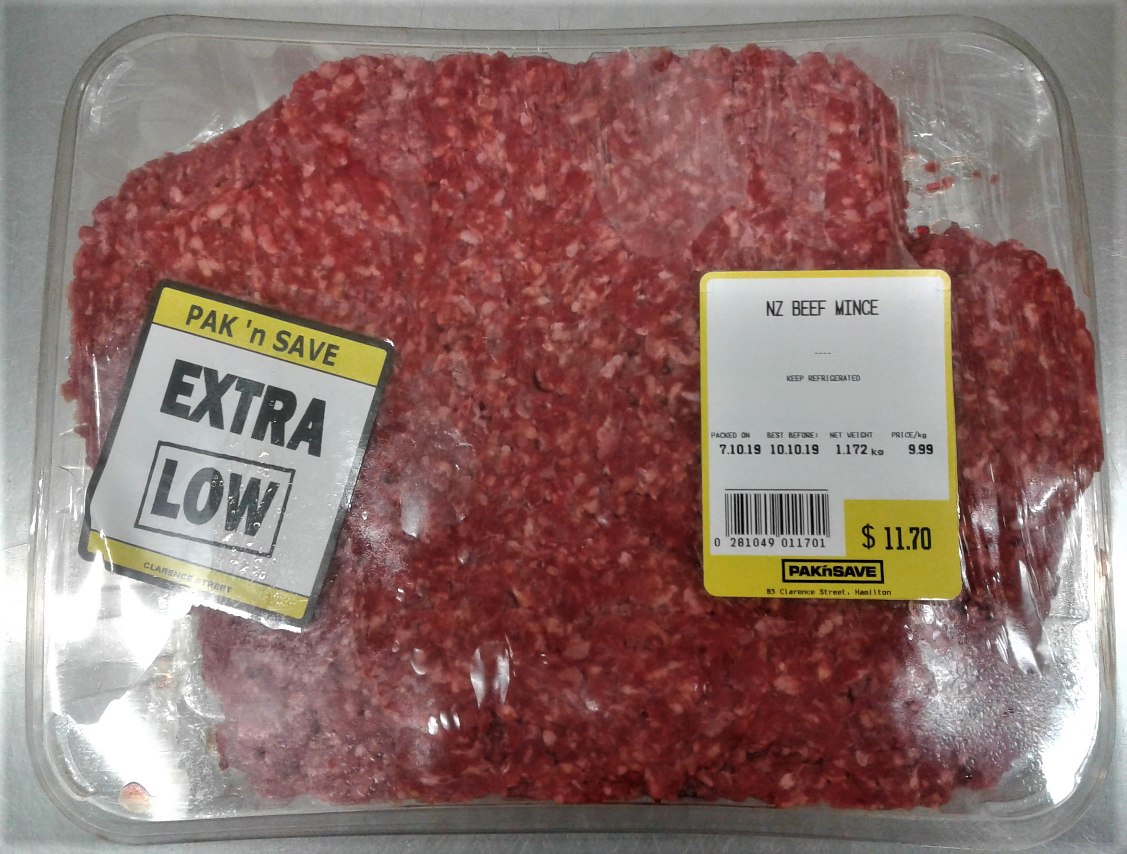 A pack of ground mice in a plastic covered meat tray. Attached to the plastic are labels about the product.