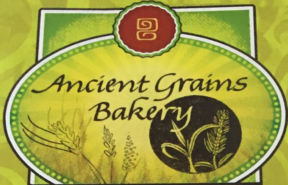 Logo of Ancient Grains Bakery brand bakery products