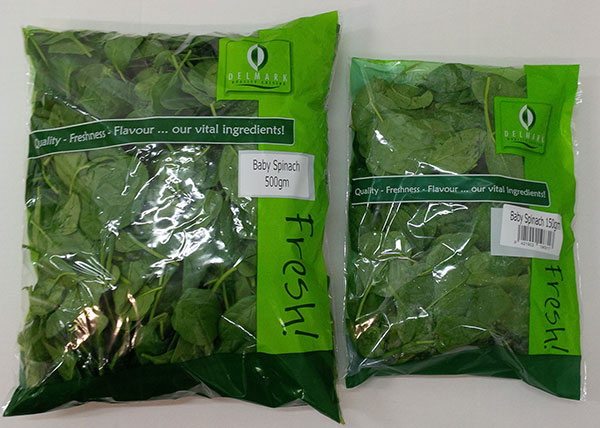 500g and 150g bags of Delmark brand baby spinach