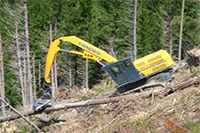 climbmax machine picking up logs on a slope