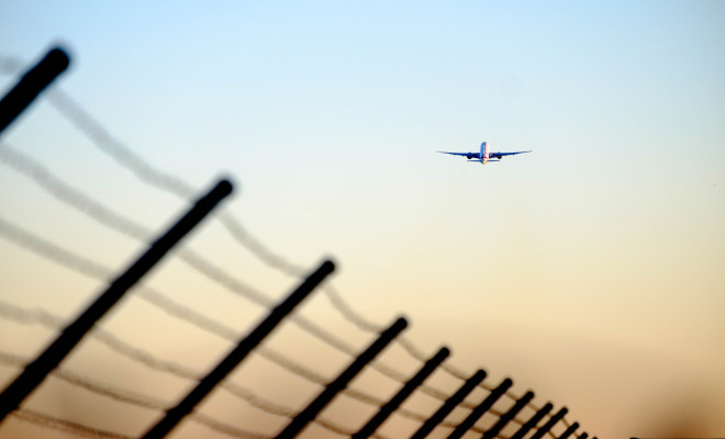 Airplane flying off.